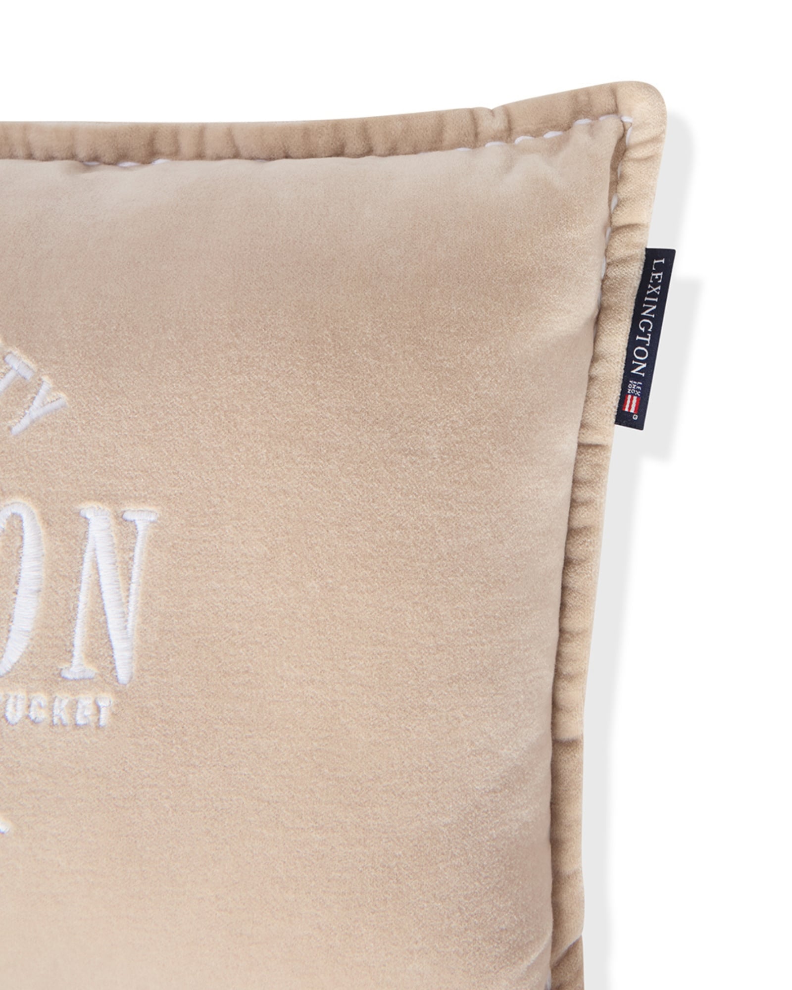 Lexington kudde beige logotyp i ekologisk bomullssammet